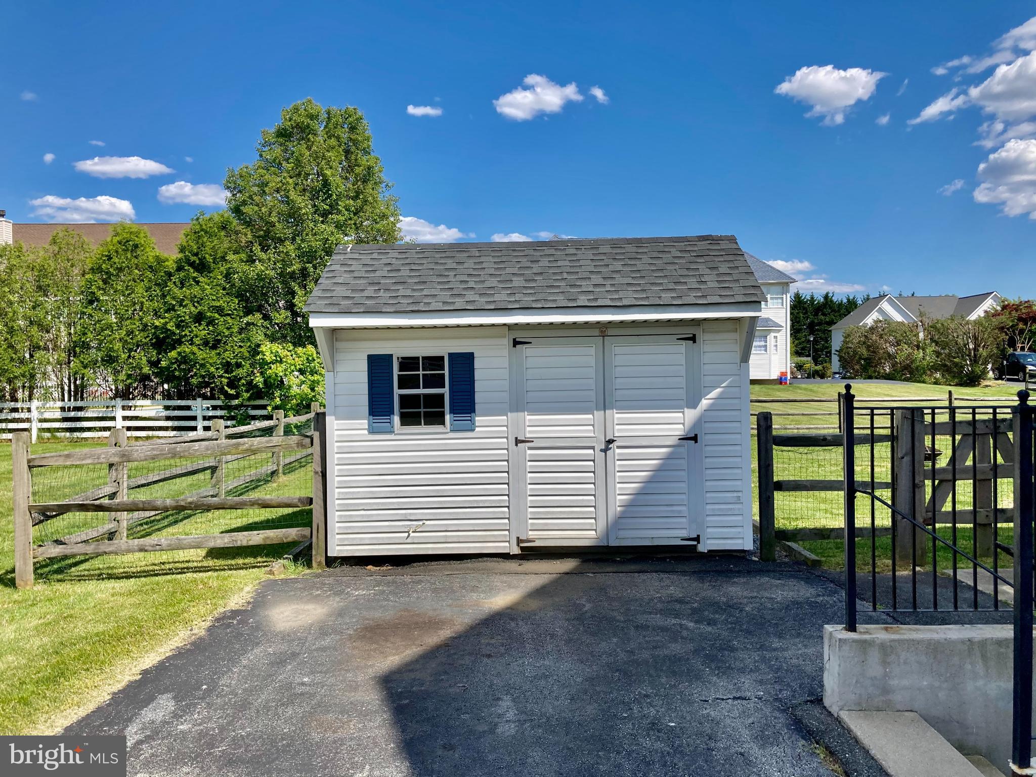 227 Mariners Way Bear, DE 19701 - Photo 19 of 19 a front view of a house with a yard