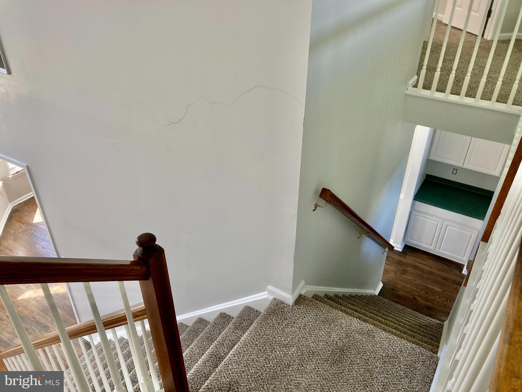 227 Mariners Way Bear, DE 19701 - Photo 9 of 19 a view of an empty room and wooden floor