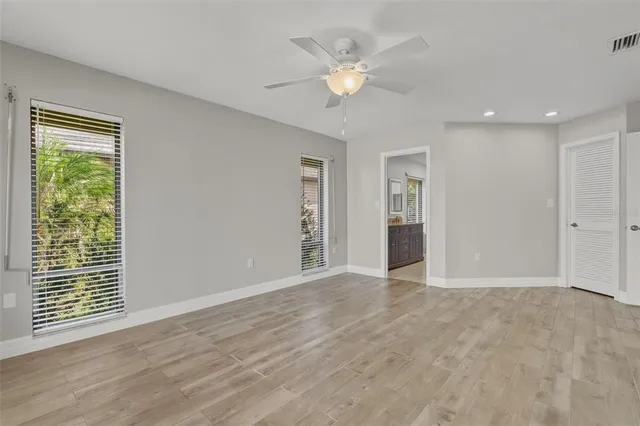 a view of an empty room with a window