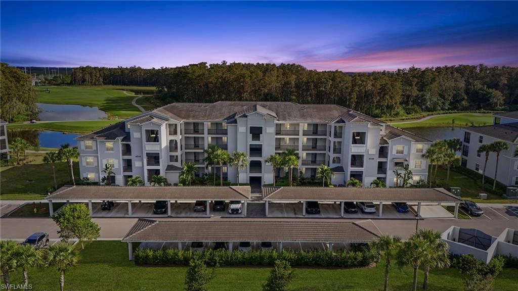 6046 National Boulevard, Unit 446 Immokalee, FL 34142 - Photo 1 of 50 a view of multiple houses with a city street