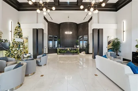 a view of a swimming pool and an outdoor seating