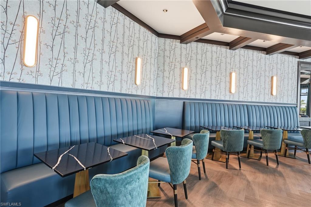 6046 National Boulevard, Unit 446 Immokalee, FL 34142 - Photo 28 of 50 an outdoor sitting area with furniture