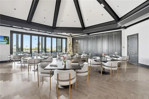 an outdoor sitting area with furniture