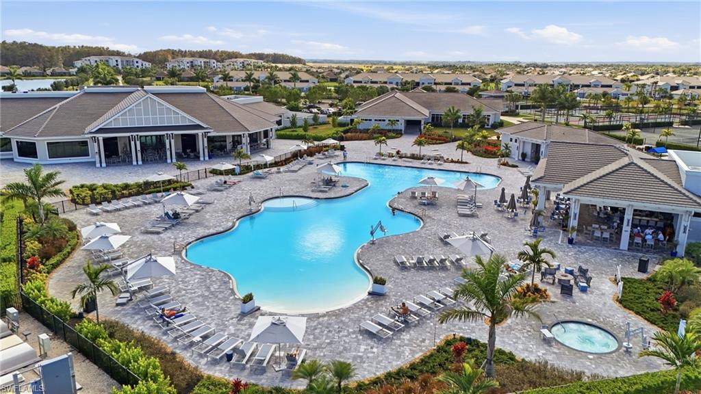 6046 National Boulevard, Unit 446 Immokalee, FL 34142 - Photo 40 of 50 an aerial view of a house with yard swimming pool and outdoor seating