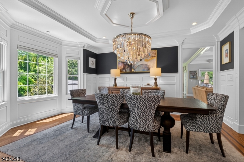921 Harding Street Westfield, NJ 07090 - Photo 11 of 50 a view of a dining room with furniture a chandelier and window