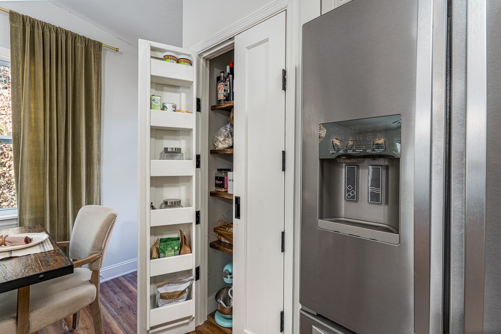 45 Mountain Stream Road Murphy, NC 28906 - Photo 12 of 42 a kitchen with stainless steel appliances granite countertop a refrigerator and a chair