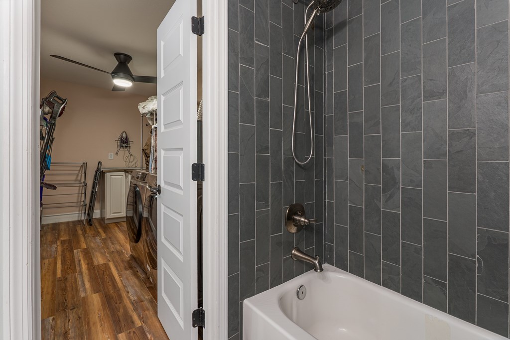45 Mountain Stream Road Murphy, NC 28906 - Photo 26 of 42 a bathroom with a bathtub and a shower