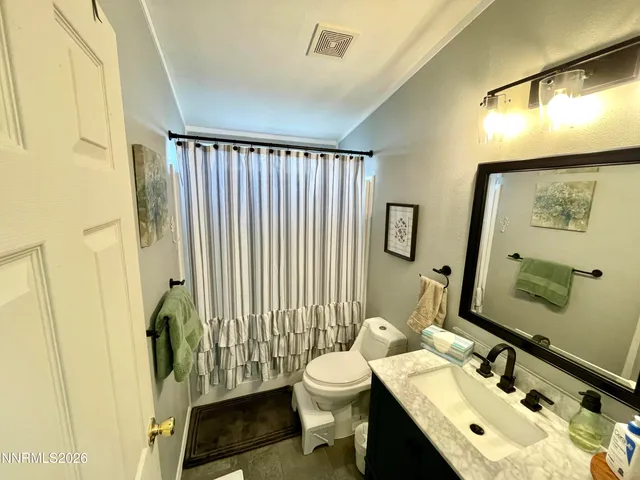 a utility room with window washer and dryer