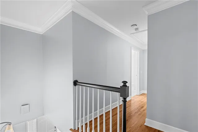 a view of a hallway view with staircase