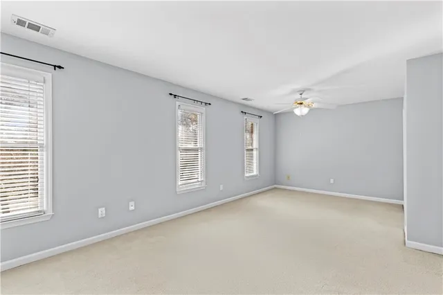 an empty room with windows