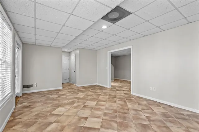 a view of an empty room and window