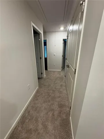 a bathroom with a double vanity sink and mirror