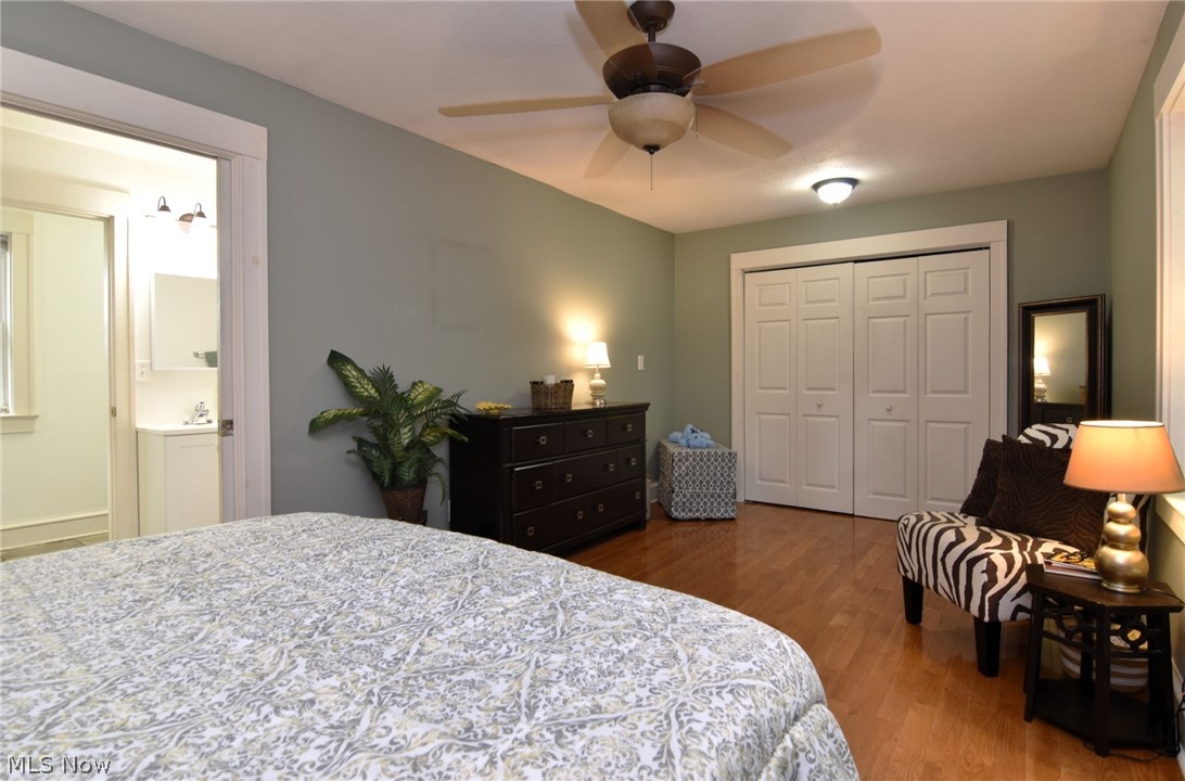 3584 Pennington Road Cleveland, OH 44120 - Photo 26 of 42 Bedroom with a closet, ceiling fan, and hardwood / wood-style floors