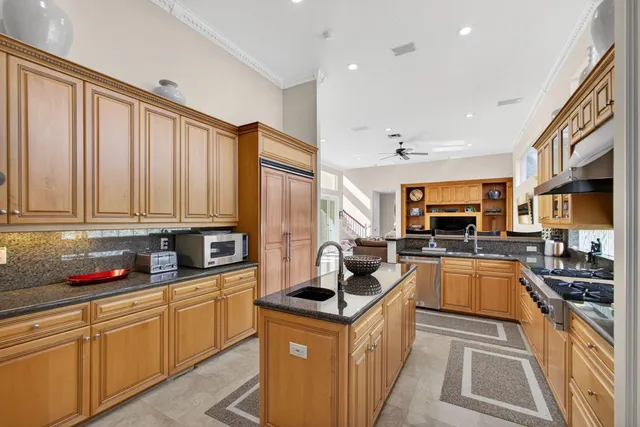 a bathroom with a toilet a sink and a mirror