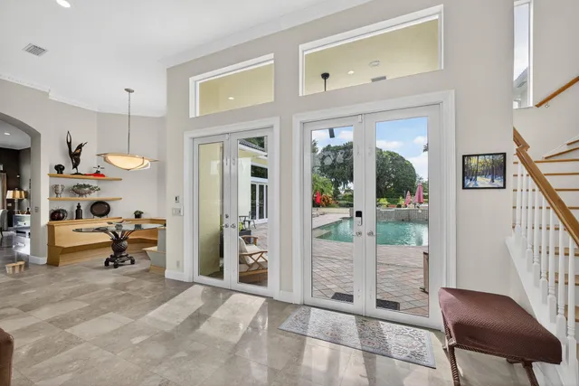 a kitchen with stainless steel appliances granite countertop a stove and a sink