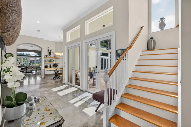 a kitchen with stainless steel appliances granite countertop a stove and a sink