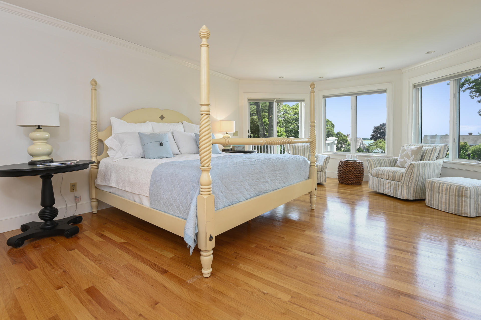 22 Little Bay Road Orleans, MA 02653 - Photo 17 of 39 a bedroom with a bed and large windows