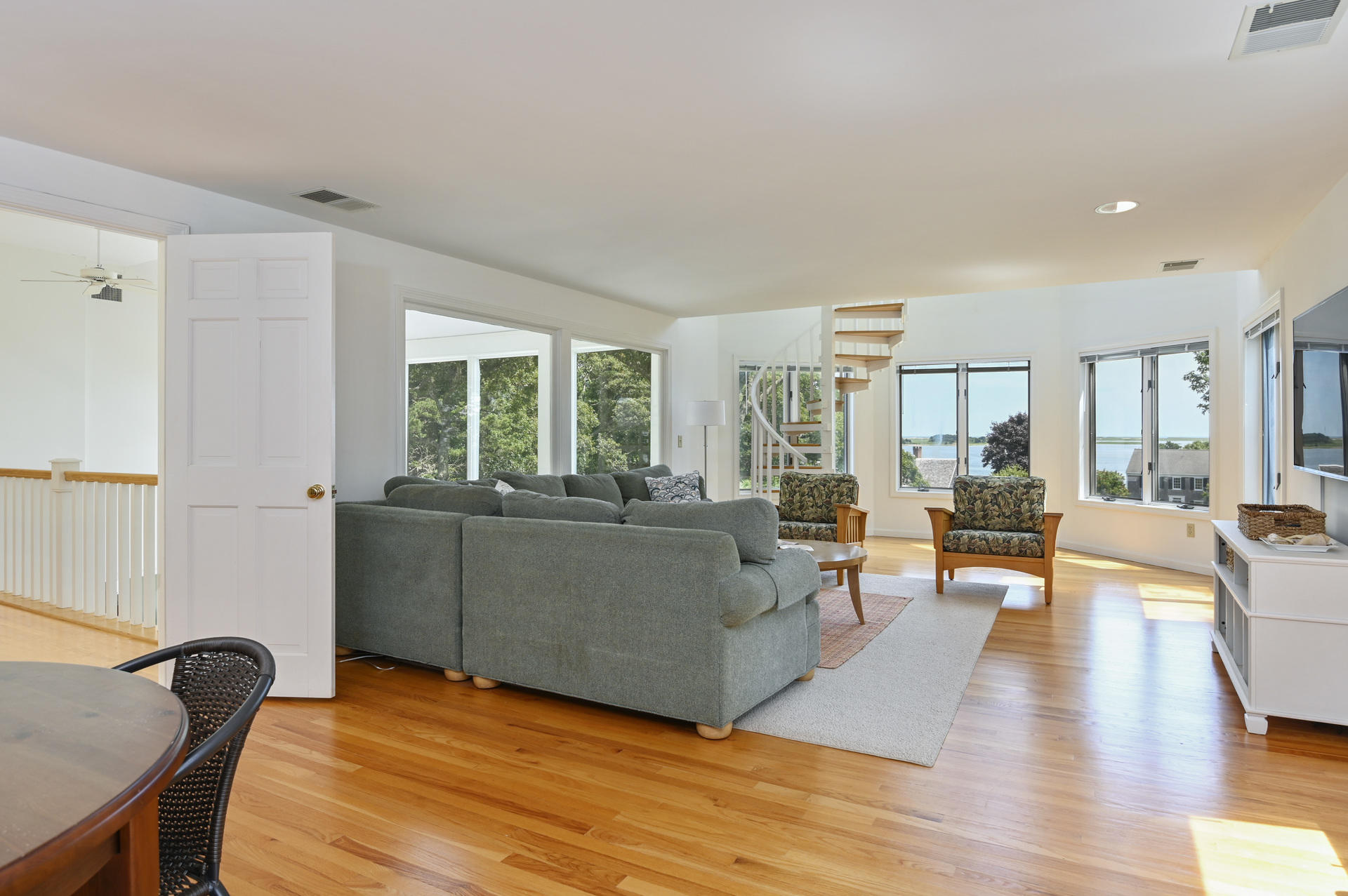22 Little Bay Road Orleans, MA 02653 - Photo 20 of 39 a living room with furniture and a wooden floor