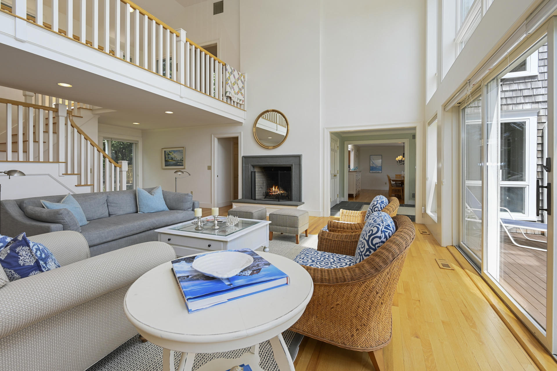 22 Little Bay Road Orleans, MA 02653 - Photo 8 of 39 a living room with furniture and a fireplace