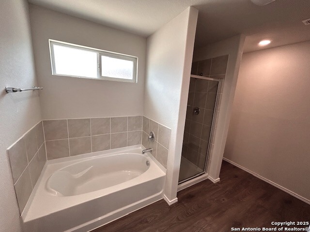 3815 Rusted Copper Bulverde, TX 78163 - Photo 19 of 36 a white bath tub sitting next to a window