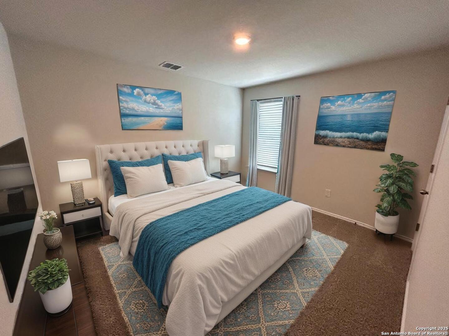 3815 Rusted Copper Bulverde, TX 78163 - Photo 21 of 36 a bedroom with a bed and painting on the wall