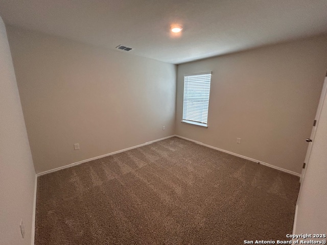 3815 Rusted Copper Bulverde, TX 78163 - Photo 22 of 36 an empty room with windows