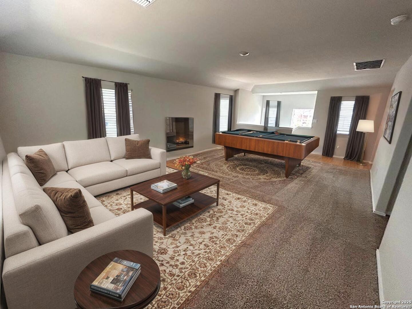 3815 Rusted Copper Bulverde, TX 78163 - Photo 26 of 36 a living room with furniture and a rug