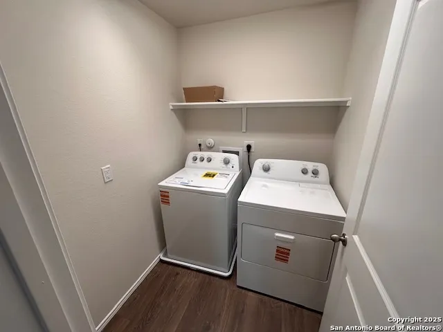 a utility room with dryer and washer