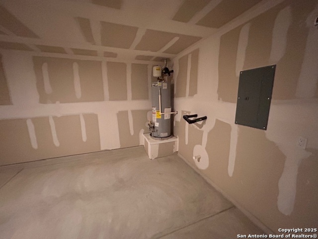 3815 Rusted Copper Bulverde, TX 78163 - Photo 34 of 36 a view of an empty room with wooden floor and white cabinet