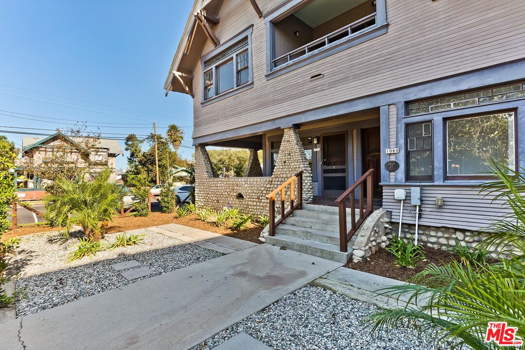 1054 Maine Avenue, Unit 3 Long Beach, CA 90813 - Photo 5 of 13 front view of a house with a yard