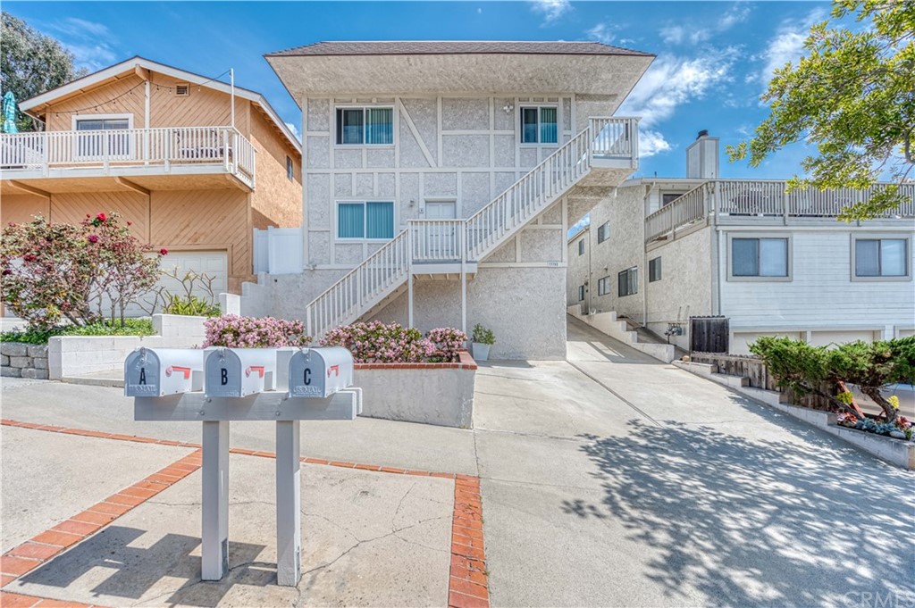 33782 Malaga Drive, Unit A Dana Point, CA 92629 - Photo 3 of 17 a view of house with outdoor space and sitting area