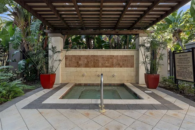 a backyard of a house with seating space