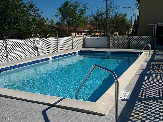 a view of a patio with a yard