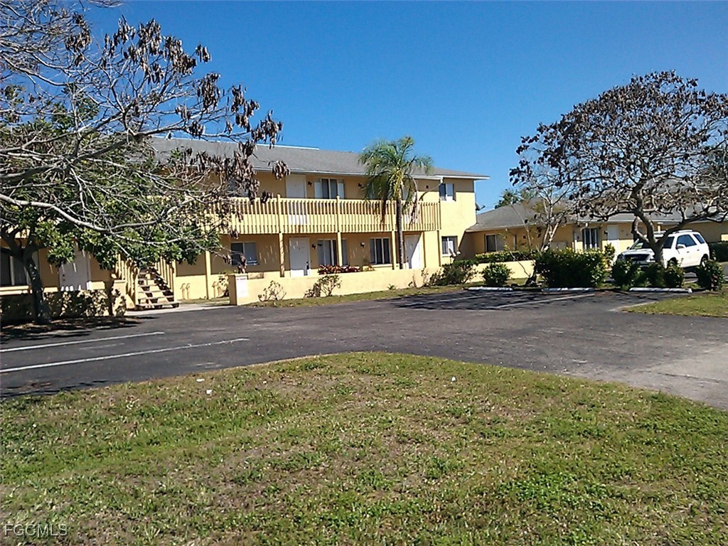 4613 Southwest 8th Place, Unit 4 Cape Coral, FL 33914 - Photo 2 of 16 a view of city with tall buildings