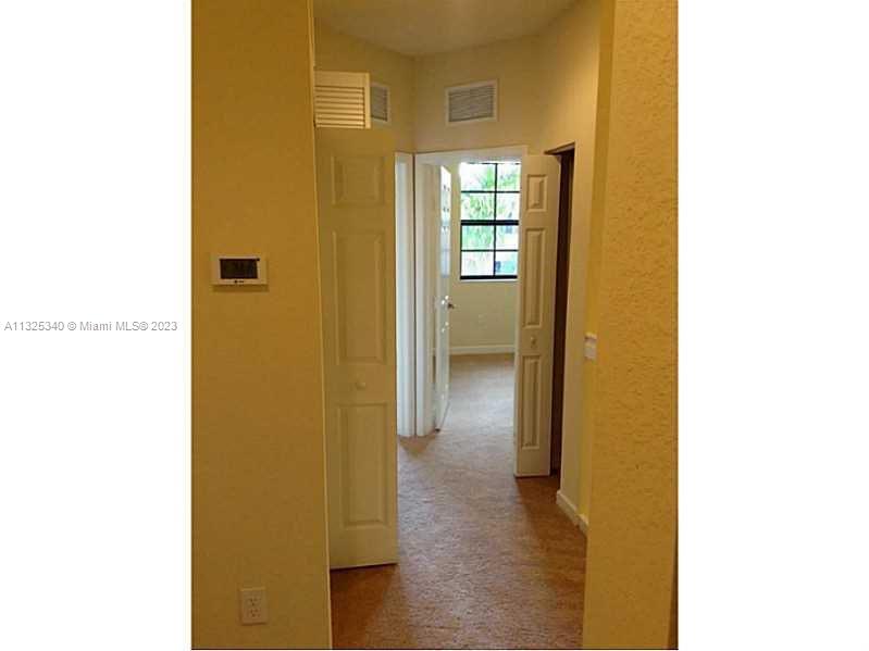 8946 West 35th Way Hialeah, FL 33018 - Photo 11 of 25 a view of a bathroom with a door