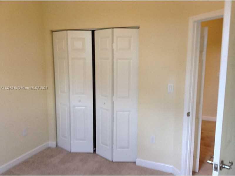 8946 West 35th Way Hialeah, FL 33018 - Photo 20 of 25 a view of a closet area