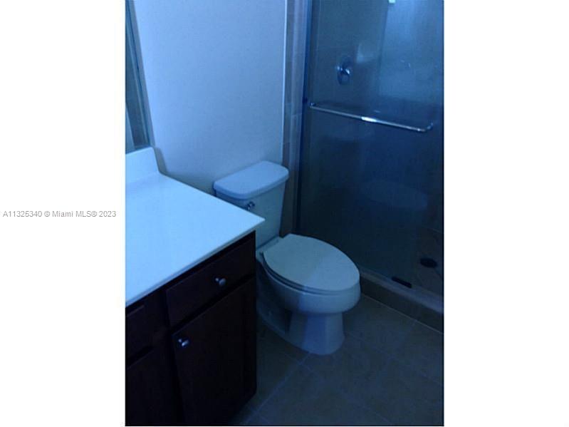 8946 West 35th Way Hialeah, FL 33018 - Photo 24 of 25 a bathroom with a toilet and a vanity