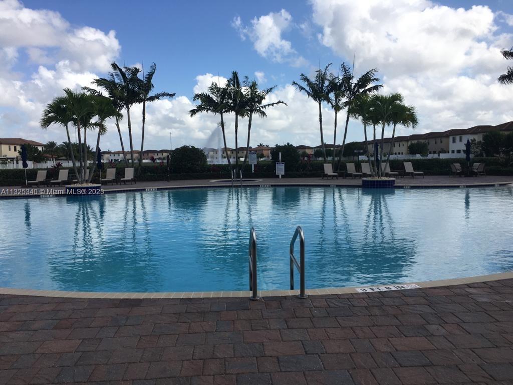 8946 West 35th Way Hialeah, FL 33018 - Photo 6 of 25 a view of a lake with a palm tree