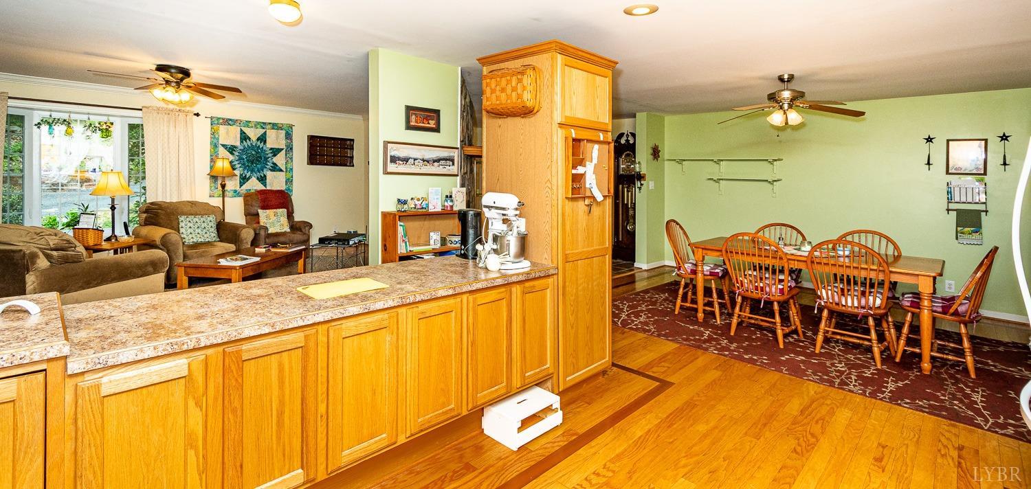552 Pendleton Drive Amherst, VA 24521 - Photo 16 of 58 a dining hall with stainless steel appliances granite countertop a granite counter tops and a view of living room