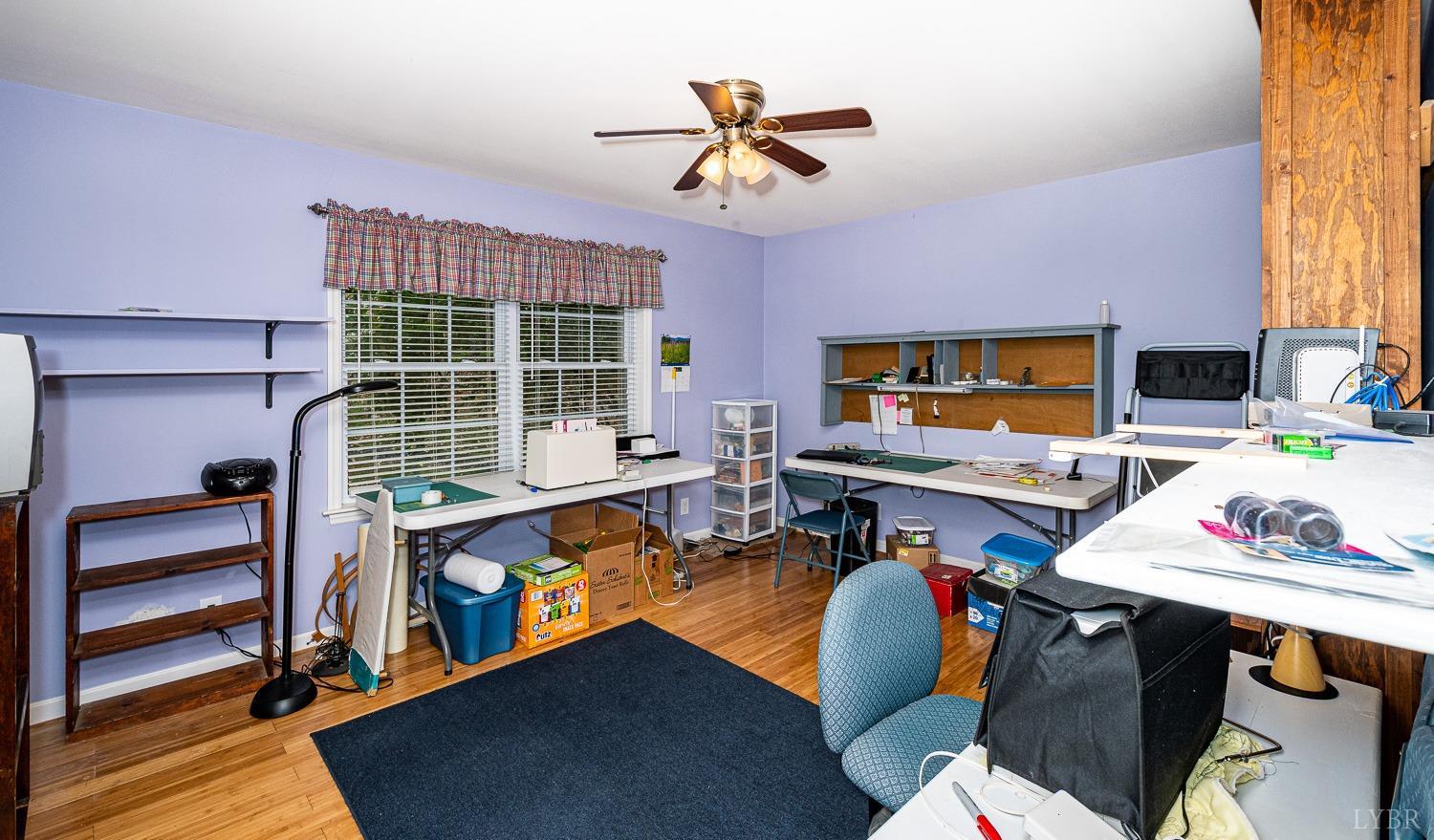552 Pendleton Drive Amherst, VA 24521 - Photo 38 of 58 a bed room with furniture and a window