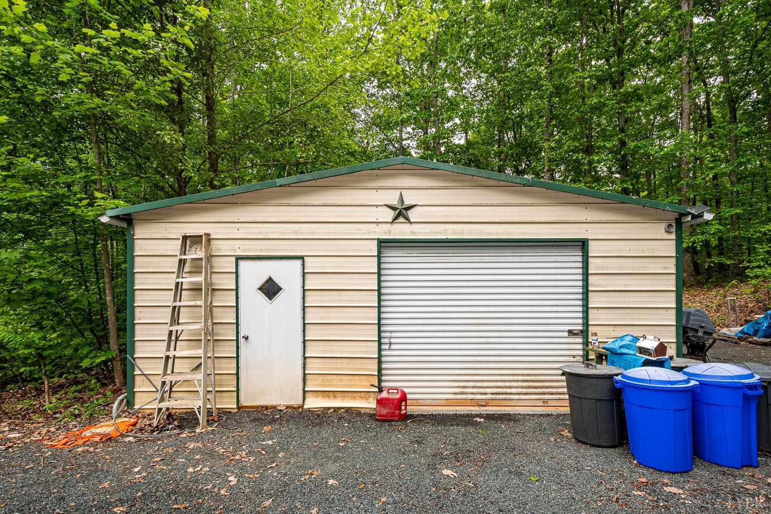 552 Pendleton Drive Amherst, VA 24521 - Photo 50 of 58 a view of a small house with yard