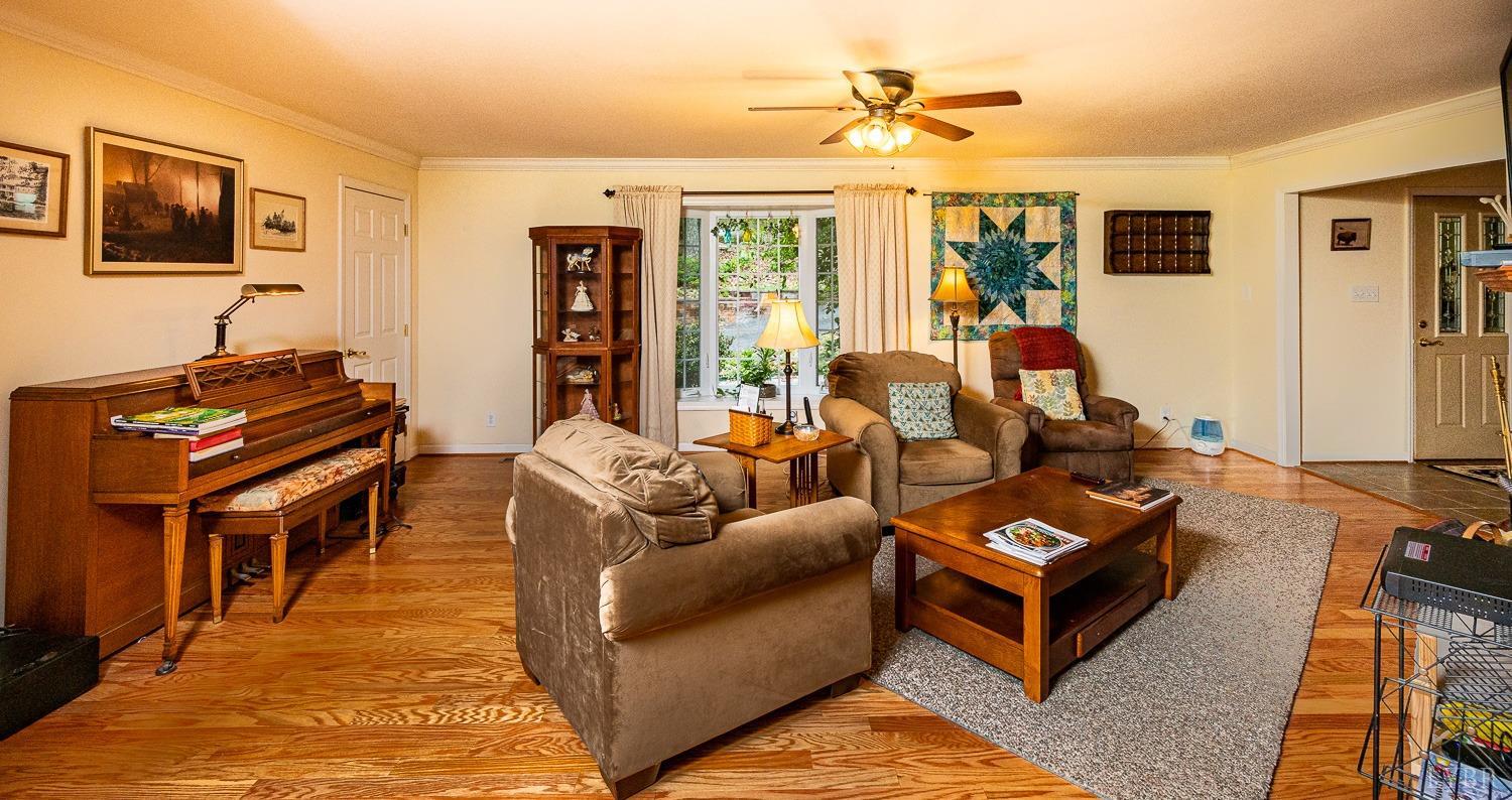 552 Pendleton Drive Amherst, VA 24521 - Photo 6 of 58 a living room with furniture a flat screen tv and a window