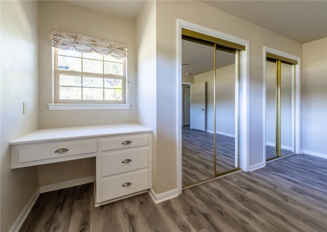 11801 Bell Avenue Austin, TX 78759 - Photo 14 of 31 a view of an entryway with wooden floor and cabinet