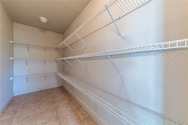 a view of a room with racks on the wall