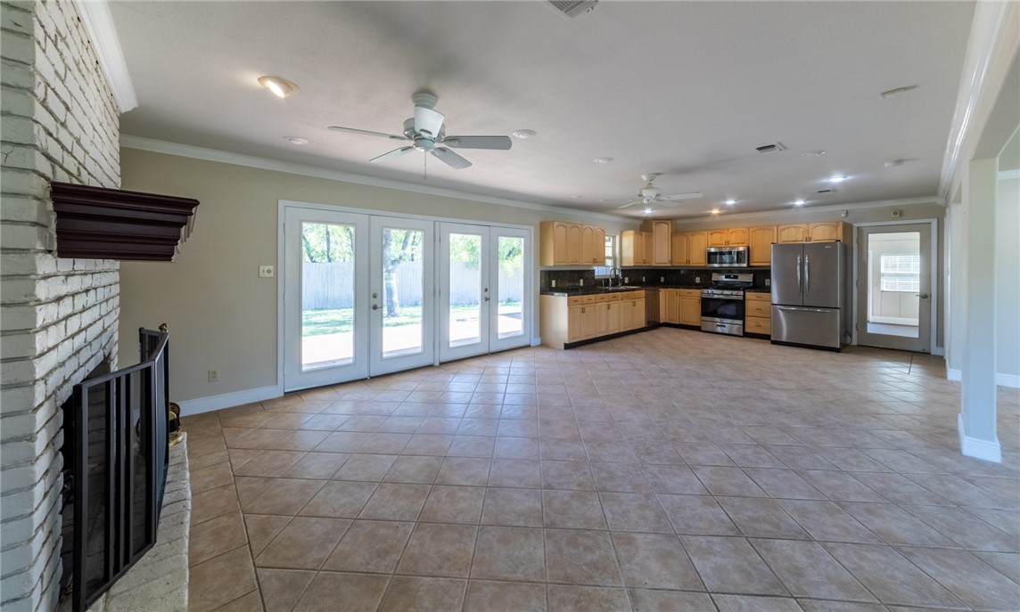 11801 Bell Avenue Austin, TX 78759 - Photo 2 of 31 a view of a hall with furniture and a ceiling fan