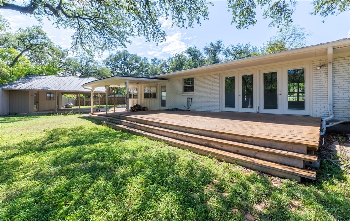 11801 Bell Avenue Austin, TX 78759 - Photo 30 of 31 a front view of a house with a yard table and chairs