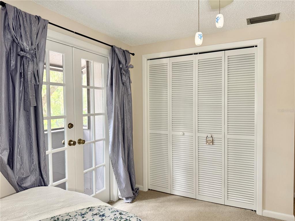 6101 Soaring Avenue Temple Terrace, FL 33617 - Photo 28 of 53 a bathroom with a tub and a shower
