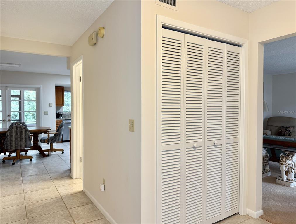 6101 Soaring Avenue Temple Terrace, FL 33617 - Photo 3 of 53 a view of dining room with furniture and floor to ceiling window