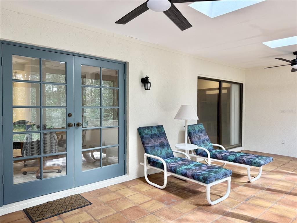 6101 Soaring Avenue Temple Terrace, FL 33617 - Photo 40 of 53 a living room with furniture and a window