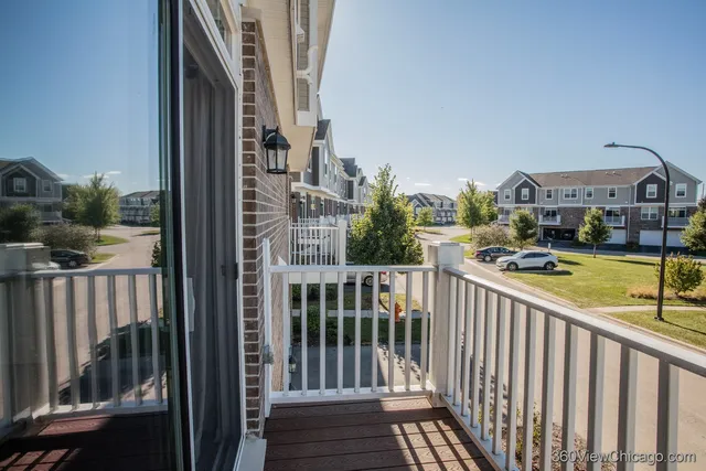 a view of a balcony with city view